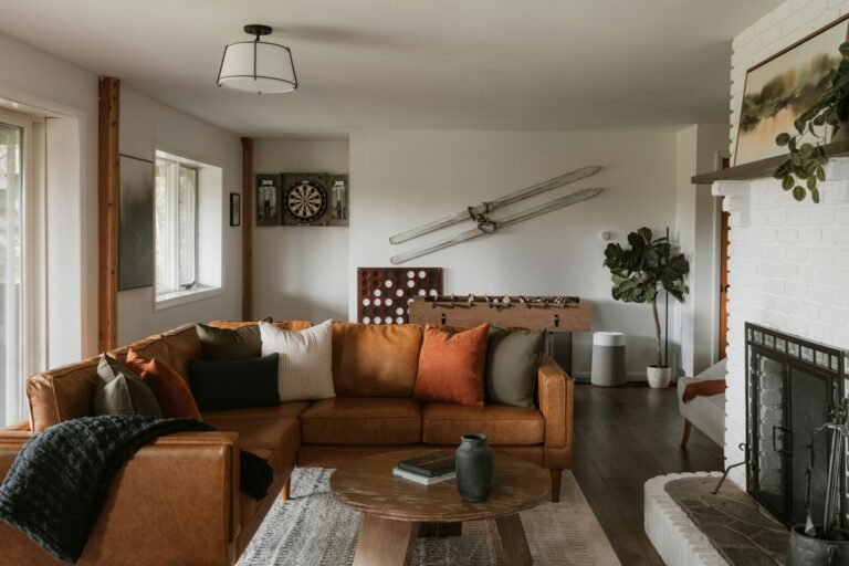 A cozy living room with a brown sectional sofa.