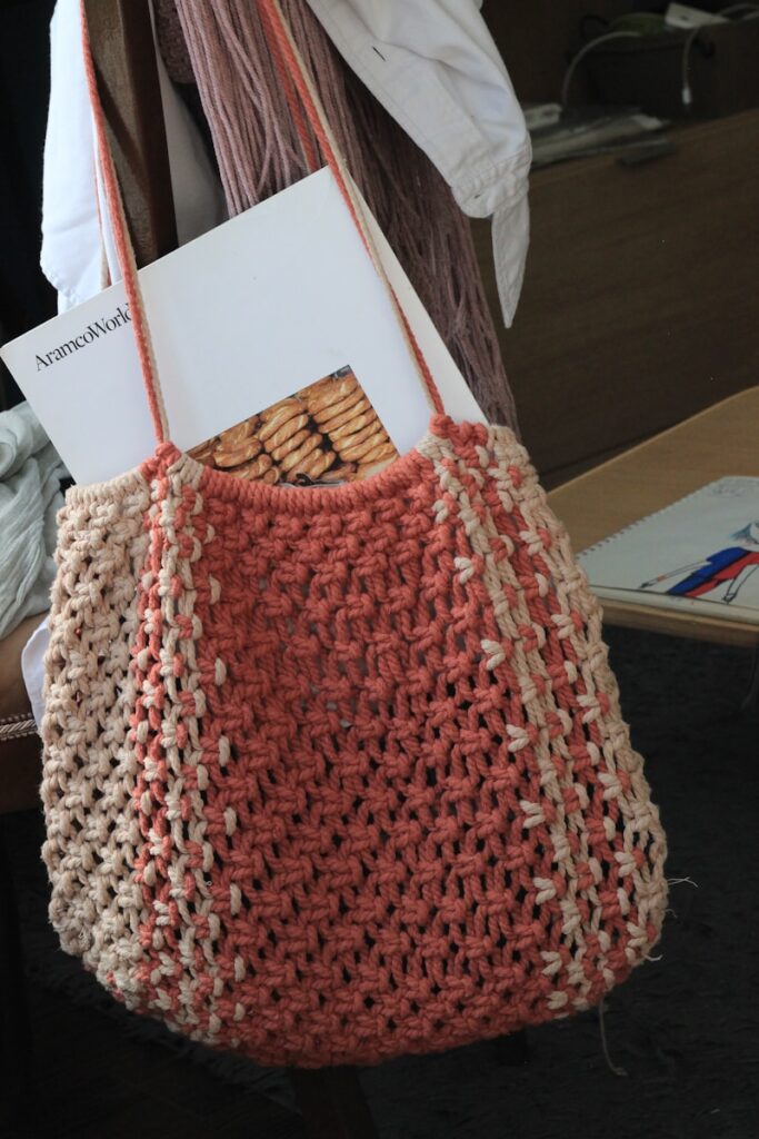 red knit textile on brown wooden table