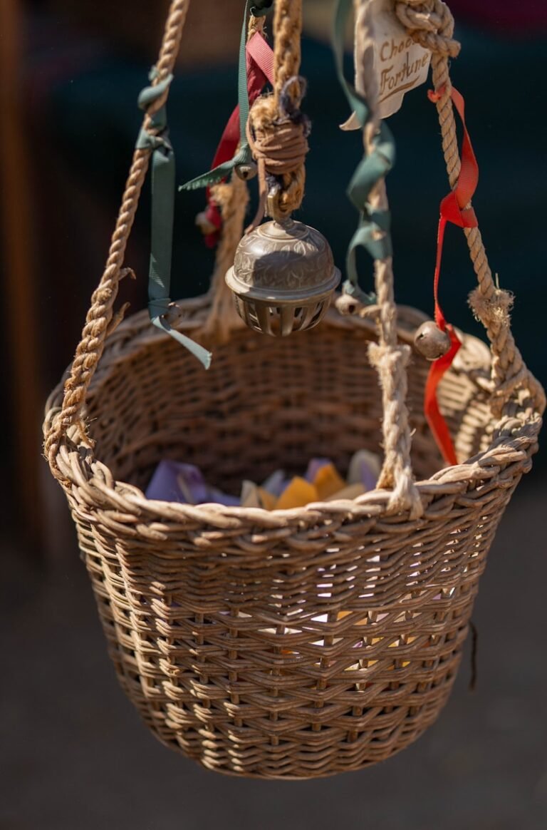 a wicker hanging basket filled with soaps