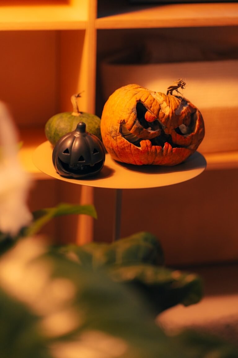 A couple of pumpkins sitting on top of a table