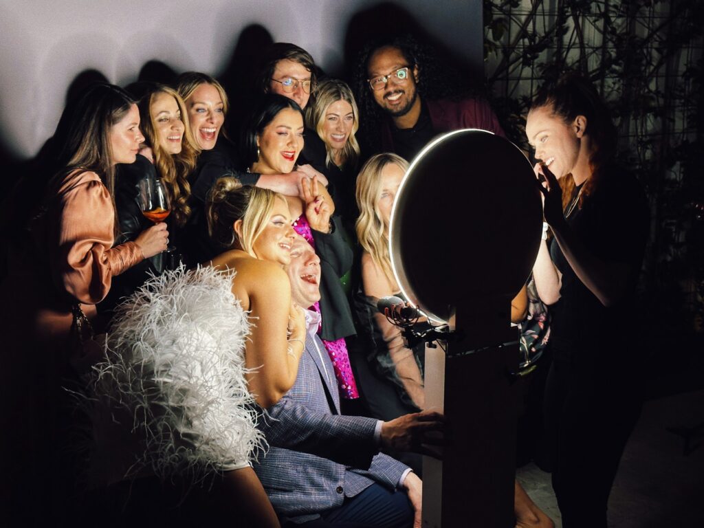 A group of people standing next to each other